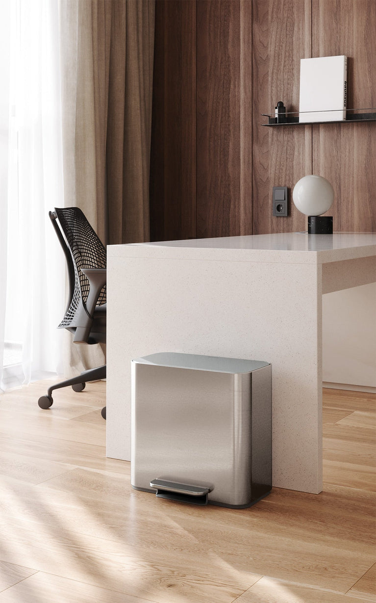 Simplehuman's Mini Can in a modern office space setting. 