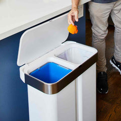 58L dual compartment rectangular sensor bin with voice and motion control - white steel - lifestyle dual compartments throwing rubbish away